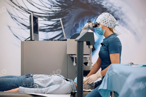 Preview: Eye surgeon and her patient during laser surgery at the clinic.