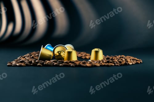 Preview: on black-blue background lie roasted coffee beans laid out in the shape of a heart in the contrast