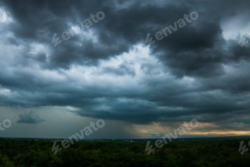 Preview: Dark Storm Clouds Over Forested Landscape and City