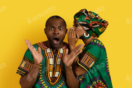 Preview: Black woman sharing secrets with husband, whisper on ear