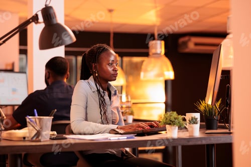 Preview: African american woman doing startup project work on computer