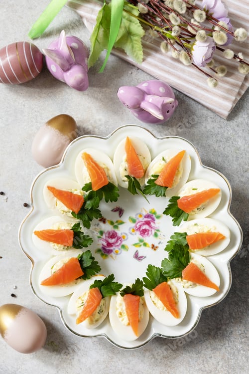 Preview: Stuffed eggs with cheese and salted salmon in the form of a carrot.