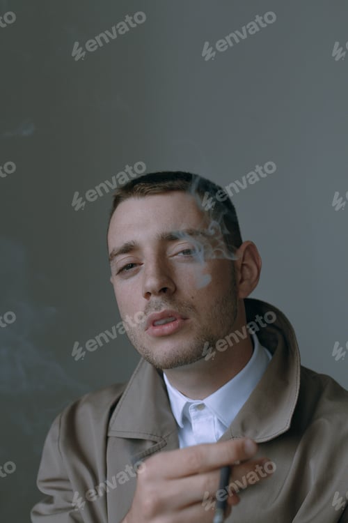 Preview: A Handsome And Lonely Guy In A Cloak With A Cigarette