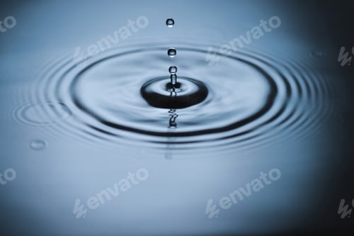 Preview: water droplets forming rings on the surface