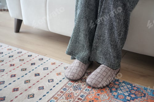 Preview: Cozy indoor setup with relaxed feet on a soft rug