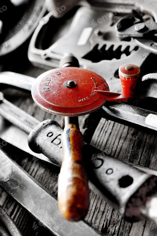 Preview: Vertical closeup shot of tools and instruments on the wooden surface