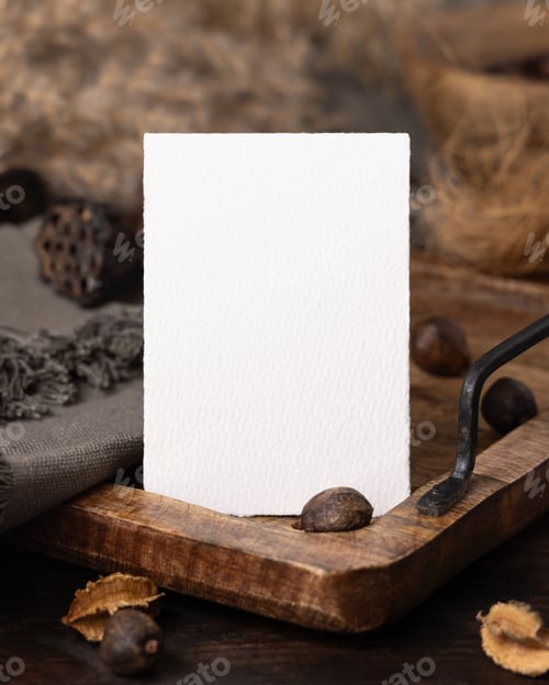 Preview: Vertical card on wooden tray near brown decor and grey linen cloth closeup, boho mockup