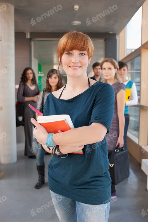 Preview: Germany, Leipzig, Women smiling, students standing in background