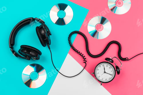 Preview: Headphones with cord on a bright color block background