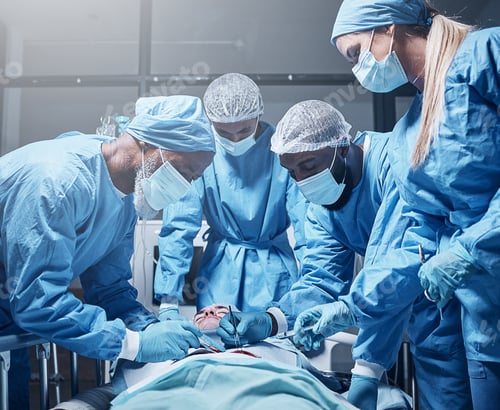 Preview: Doctors, surgery and collaboration with a medicine team in scrubs operating on a man patient in a h