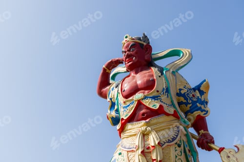 Preview: Traditional chinese guard statue over the blue sky