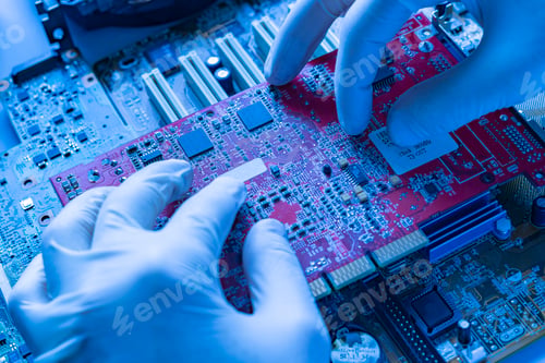 Preview: the scientist hands in gloves work with a circuit board in laboratory, close up view