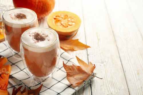 Preview: Composition with pumpkin latte on white wooden table