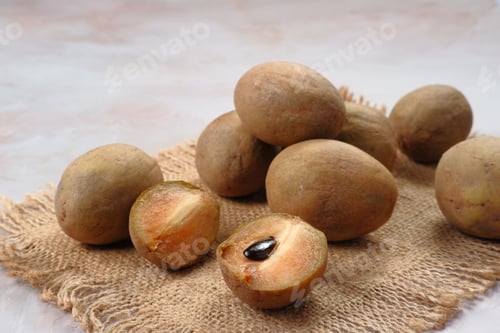 Preview: Buah sawo or Manilkara zapota, commonly known as sapodilla, sapota, chikoo, chico, naseberry, or nis