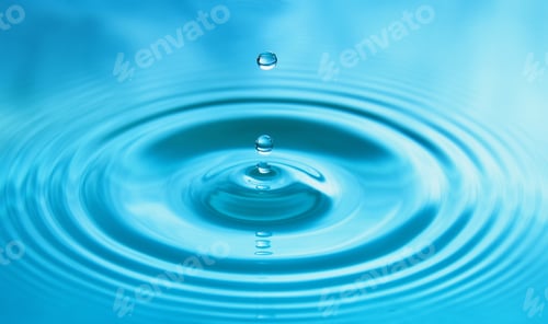 Preview: Water drop falling into water making a perfect concentric circles