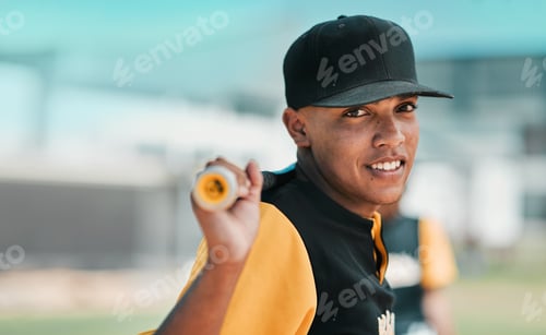 Preview: Shot of a young baseball player holding a baseball bat while posing outside on the pitch