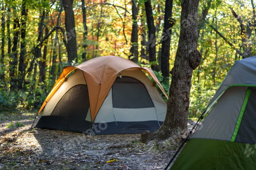 Preview: Two tents on campsite in Autumn sunlight