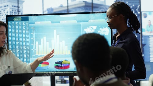 Preview: Coworkers engaging in a problem solving meeting at a corporation