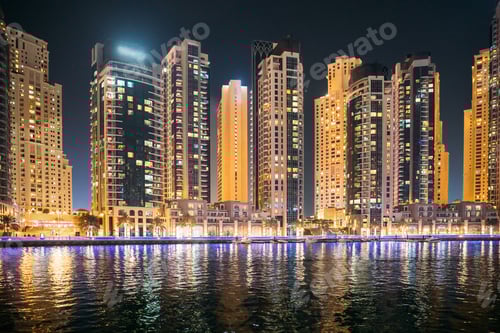 Preview: Night view of high-rise buildings of residential district in Dubai Marina. Dubai Marina Towers