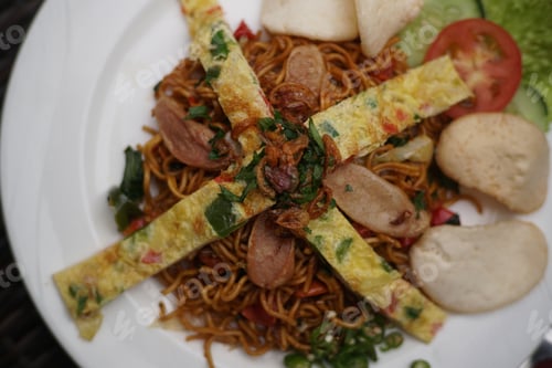 Preview: Overhead View of Noodles and Egg on Plate