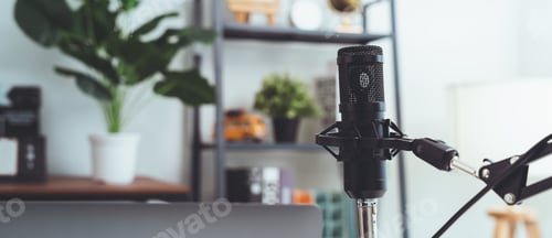 Preview: The microphone is on the table for podcast in home studio.