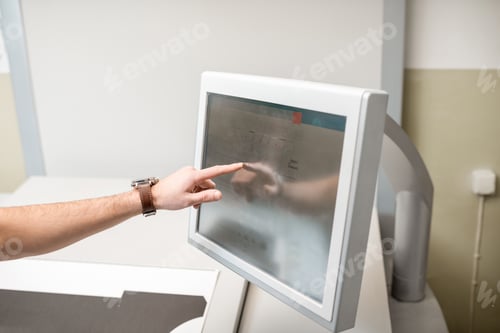 Preview: Touching the screen of the printing machine