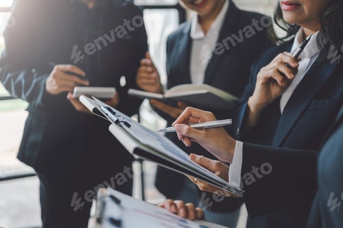 Preview: Group of business people stand together to discuss marketing plan. Sales Strategy