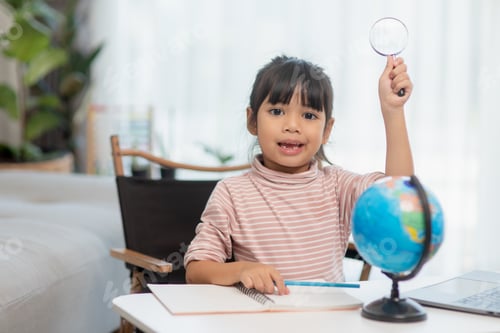 Preview: Asian little girl is learning the globe model, concept of save the world and learn through