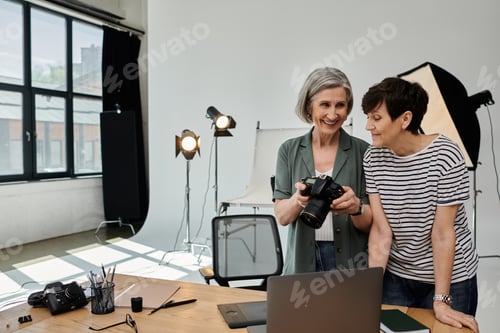 Preview: Collaborative creativity: two women inspiring ideas by the laptop