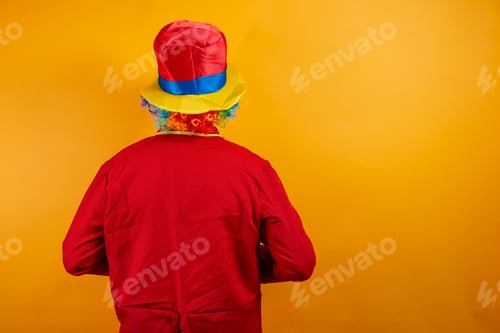 Preview: The view of a clown from behind.