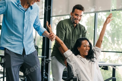 Preview: Happy diverse business team celebrating success and having fun all together