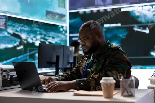 Preview: Secret service agent in an advanced control room handles surveillance activity