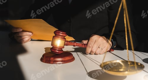 Preview: Lawyer female working with hammer and scales with document, contract, legal adviser concept.