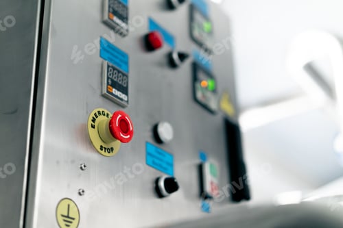 Preview: Industrial Emergency Stop Button on Metal Control Panel