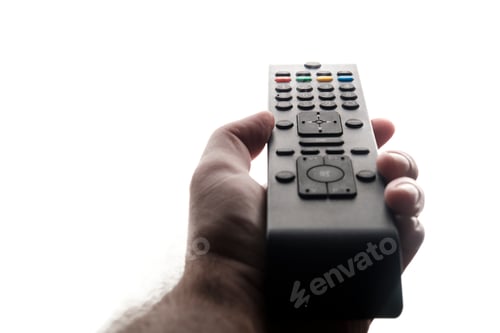 Preview: Hand holding tv remote isolated on white background.