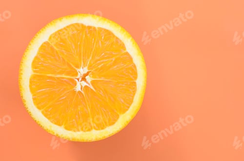Preview: Top view of a one orange fruit slice on bright background in orange color