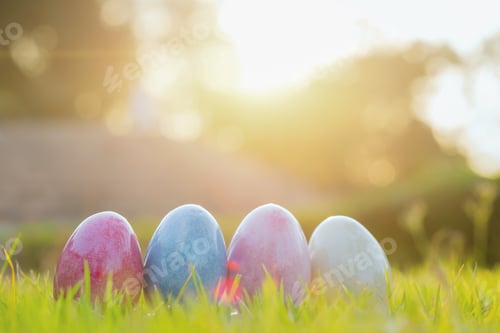 Preview: Copy space background of Easter eggs in Fresh Green Grass.