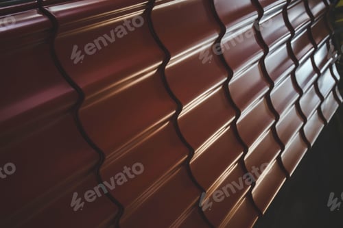 Preview: Closeup shot of steel tile roof on dark background