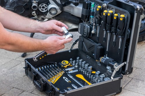Preview: A technician man inspecting the case with the instruments