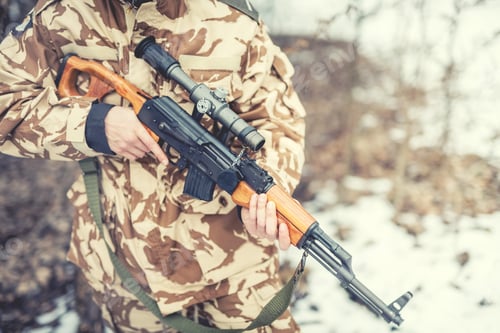 Preview: details of equipment and gun on military ranger - War, hunting or protection concept with man