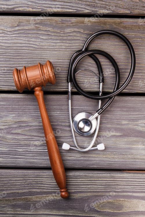 Preview: Wooden gavel and stethoscope.