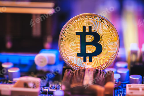 Vista previa: Bitcoin crypto currency on circuit board .virtual money.blockchain technology.mining concept