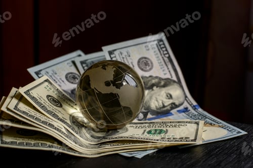 Preview: transparent globe on dollars