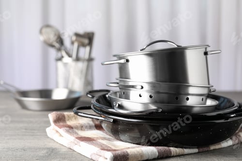 Preview: Kitchen utensil on gray textured table, selective focus