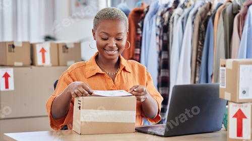 Preview: Black woman, fashion designer and label box in small business for courier service or delivery at bo