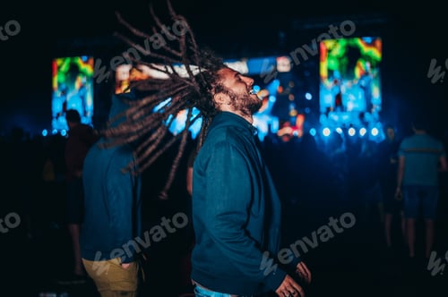 Preview: Man with dreadlocks on a music festival