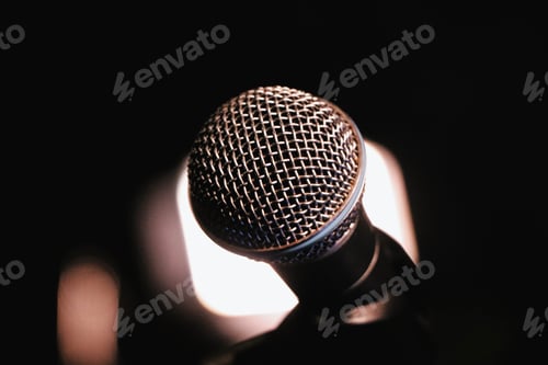 Preview: Closeup shot of a microphone on the stage