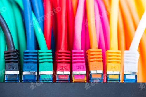 Colorful Network Cables Connected to a Switch