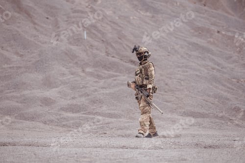 Preview: Soldiers in camouflage military uniforms carrying weapons Reconnaissance missions in rugged mountain