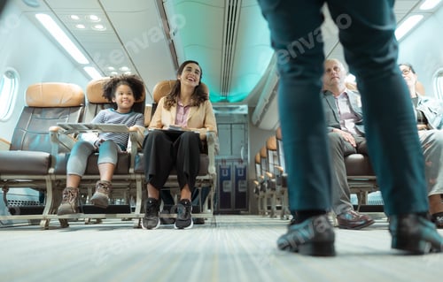 Preview: Flight attendants show how to use safety devices and recommend emergency exits.